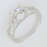 Sterling silver semi mount engagement ring setting with intricate design, ready for personalization with moissanite or gemstone.